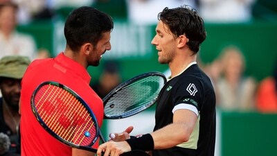 Serbia's Novak Djokovic (L) shakes hands with Norway's Casper Ruud at the end of their Monte Carlo ATP Masters Series Tournament semi final tennis match (AFP) Serbia's Novak Djokovic (L) shakes hands with Norway's Casper Ruud at the end of their Monte Carlo ATP Masters Series Tournament semi final tennis match (AFP)