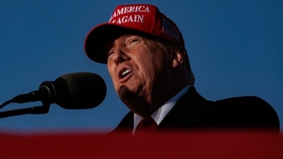 Former US President Donald Trump speaks during a campaign rally at the Schnecksville Fire Hall in Schnecksville, Pennsylvania, US, on Saturday, April 13, 2024. Trump on Friday offered support for embattled House Speaker Mike Johnson who is fighting to keep his job under pressure from ultraconservative lawmakers, seeking to tamp down on divisions in the Republican caucus. Photographer: Hannah Beier/Bloomberg (Bloomberg)