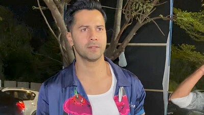 Varun Dhawan looked ready to party in a blue shirt, white vest and ripped jeans. Varun Dhawan looked ready to party in a blue shirt, white vest and ripped jeans. 