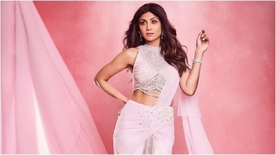 Shilpa Shetty's love for the six yards is no secret. The actor's wardrobe is full of sarees for every occasion, from silk numbers to embroidered designer drapes to couture-worthy looks. Shilpa's latest photoshoot in a beautiful statement saree backs our statement. The actor took to Instagram to share pictures of herself dressed in an experimental saree that adds a fresh twist to ethnic festive outfits. Scroll through to see the ensemble. (Instagram) Shilpa Shetty's love for the six yards is no secret. The actor's wardrobe is full of sarees for every occasion, from silk numbers to embroidered designer drapes to couture-worthy looks. Shilpa's latest photoshoot in a beautiful statement saree backs our statement. The actor took to Instagram to share pictures of herself dressed in an experimental saree that adds a fresh twist to ethnic festive outfits. Scroll through to see the ensemble. (Instagram)