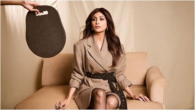 Earlier, Shilpa shared another photoshoot of herself on Instagram with the caption, "In the moment #LookOfTheDay #OOTD." She wore an embellished blazer dress for the pictures that comes in a beige shade. The ensemble is from the Rokh X H&M collection. (Instagram) Earlier, Shilpa shared another photoshoot of herself on Instagram with the caption, "In the moment #LookOfTheDay #OOTD." She wore an embellished blazer dress for the pictures that comes in a beige shade. The ensemble is from the Rokh X H&M collection. (Instagram)