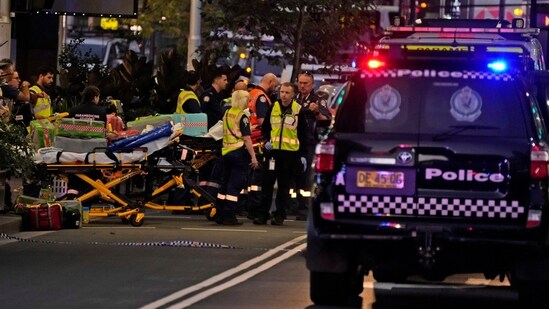 Stretchers outside Westfield Shopping Centre where multiple people were stabbed in Sydney on Saturday. (AP)