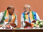 Prime Minister Narendra Modi, defence minister Rajnath Singh during the launch of BJP's Sankalp Patra for Lok Sabha Elections 2024 at BJP HQ, in New Delhi, India, on Sunday, April 14, 2024. (Photo by Ajay Aggarwal/ Hindustan Times)(Hindustan Times)