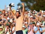 Scottie Scheffler of the United States celebrates on the 18th green after winning the 2024 Masters Tournament at Augusta 