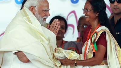 PM Narendra Modi being felicitated by Bharatiya Janata Party (BJP) Alathur candidate TN Sarasu during a public meeting for the upcoming Lok Sabha polls, at Alathur, in Palakkad on Monday. (BJP) PM Narendra Modi being felicitated by Bharatiya Janata Party (BJP) Alathur candidate TN Sarasu during a public meeting for the upcoming Lok Sabha polls, at Alathur, in Palakkad on Monday. (BJP)