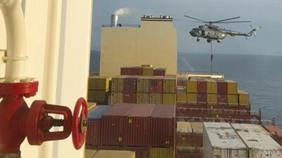 This image shows a helicopter raid targeting a vessel near the Strait of Hormuz on Saturday This image shows a helicopter raid targeting a vessel near the Strait of Hormuz on Saturday