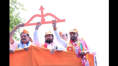 After meeting Chief Minister Eknath Shinde on Monday, Awade decided not to contest the polls. By afternoon, he joined a rally attended by the Chief Minister when Dhairyasheel Mane and Sanjay Mandlik filed their nomination papers in Kolhapur. (HT PHOTO) After meeting Chief Minister Eknath Shinde on Monday, Awade decided not to contest the polls. By afternoon, he joined a rally attended by the Chief Minister when Dhairyasheel Mane and Sanjay Mandlik filed their nomination papers in Kolhapur. (HT PHOTO)