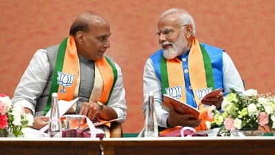 Prime Minister Narendra Modi, defence minister Rajnath Singh during the launch of BJP's Sankalp Patra for Lok Sabha Elections 2024 at BJP HQ, in New Delhi, India, on Sunday, April 14, 2024.  (Photo by Ajay Aggarwal/ Hindustan Times) (Hindustan Times)