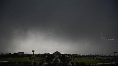 Clouds and lightning above Akshardham Temple in New Delhi on Saturday. (Raj K Raj/HT Photo) Clouds and lightning above Akshardham Temple in New Delhi on Saturday. (Raj K Raj/HT Photo)
