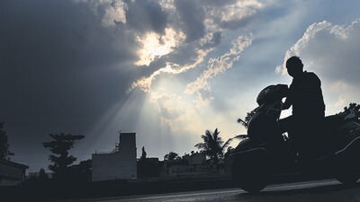 High temperature, some moisture incursion and local instability resulted in the development of cumulus clouds which later formed cumulonimbus clouds that brought thunder, lightning and a drizzle in many areas of the city. (Mahendra Kohle/HT Photo)