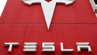 The logo of car manufacturer Tesla. The report claimed that details of the deal- its value and terms, remain undisclosed. (Reuters)