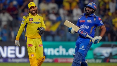 Chennai Super Kings wicket-keeper MS Dhoni and Mumbai Indians batter Rohit Sharma greet each other. (PTI)