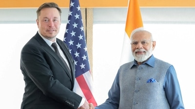 Prime Minister Narendra Modi shakes hand with Tesla chief executive Elon Musk (via REUTERS)