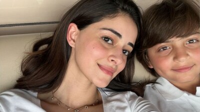 Ananya Panday poses for a selfie with Shah Rukh Khan's son AbRam during Sunday night's IPL match in Kolkata, Ananya Panday poses for a selfie with Shah Rukh Khan's son AbRam during Sunday night's IPL match in Kolkata,