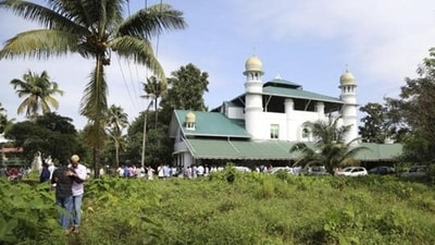 Two Muslim men greet each other after offering Eid prayers at a mosque on the flood affected island of Kunjunnikkara, outskirts of Kochi in the southern state of Kerala, India, Wednesday, Aug. 22, 2018. (AP File Photo) Two Muslim men greet each other after offering Eid prayers at a mosque on the flood affected island of Kunjunnikkara, outskirts of Kochi in the southern state of Kerala, India, Wednesday, Aug. 22, 2018. (AP File Photo)