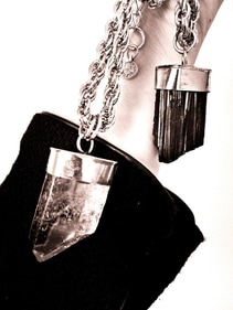 Black Tourmaline shields wearer from negativity, creating a protective aura Black Tourmaline shields wearer from negativity, creating a protective aura
