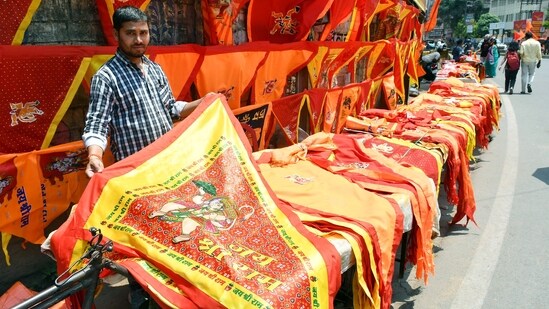 A vendor sells flags with 'Jai Shri Ram' written on it at a roasdside market ahead of Rama Navami festival in Ranchi.(ANI)