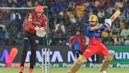 Royal Challengers Bengaluru's Virat Kohli (R) plays a shot during the Indian Premier League (IPL) Twenty20 cricket match (AFP)