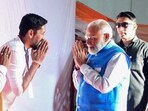 Prime Minister Narendra Modi meets Ram Lalla idol sculptor Arun Yogiraj, at Maharaja’s College Grounds, in Mysuru on Sunday. (ANI Photo) Prime Minister Narendra Modi meets Ram Lalla idol sculptor Arun Yogiraj, at Maharaja’s College Grounds, in Mysuru on Sunday. (ANI Photo)