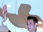 Bollywood actor Salman Khan greets fans gathered outside his residence on the occasion of Eid al-Fitr on April 11, 2024.