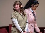 TOPSHOT - Hannah Gutierrez-Reed (L), the former armorer at the movie Rust, attends her sentencing hearing at the First Judicial District Courthouse in Santa Fe, New Mexico, April 15, 2024. The armorer who loaded the gun that killed a cinematographer on the set of the Alec Baldwin movie "Rust" was convicted March 6, 2024 of involuntary manslaughter. A jury in New Mexico took just over two hours to find Hannah Gutierrez guilty over the death of Halyna Hutchins in October 2021 during filming of the budget Western. (Photo by Eddie Moore / Journal / POOL / AFP)