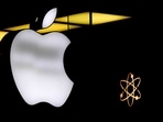 The Apple logo is illuminated at a store. The Apple logo is illuminated at a store.