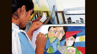 A student painting on the theme of unity in Ludhiana. (HT File Photo)