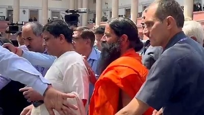 Yoga guru Ramdev and Patanjali Ayurved Ltd managing director Acharya Balkrishna appear before the Supreme Court in the misleading advertisement case filed against the company in New Delhi. (ANI) Yoga guru Ramdev and Patanjali Ayurved Ltd managing director Acharya Balkrishna appear before the Supreme Court in the misleading advertisement case filed against the company in New Delhi. (ANI)