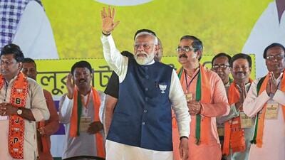 Balurghat: Prime Minister Narendra Modi with BJP candidate Sukanta Majumdar during a public meeting ahead of Lok Sabha elections in Balurghat on April 16 (PTI) Balurghat: Prime Minister Narendra Modi with BJP candidate Sukanta Majumdar during a public meeting ahead of Lok Sabha elections in Balurghat on April 16 (PTI)