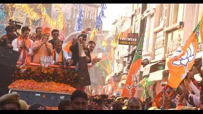 Chief minister Yogi Adityanath holds a roadshow in Saharanpur on Tuesday. (ht photo) Chief minister Yogi Adityanath holds a roadshow in Saharanpur on Tuesday. (ht photo)