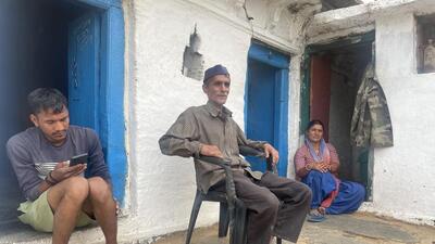 Darshan Singh Chauhan (centre), cousin of chief of defence staff General Anil Chauhan, in Gawana. (HT photo) Darshan Singh Chauhan (centre), cousin of chief of defence staff General Anil Chauhan, in Gawana. (HT photo)