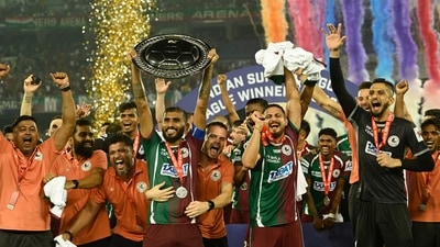 J Cummings and Petratos of Mohun Bagan SG celebrate after winning the match against Mumbai City FC and winning ISL Trophy at Salt Lake Stadium in Kolkata. (Hindustan Times)