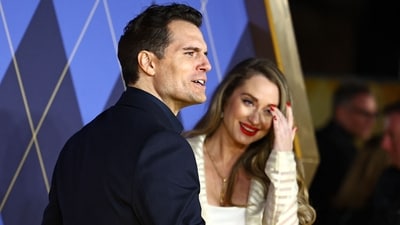British actor Henry Cavill and Natalie Viscuso pose on the red carpet upon arrival to attend the world premiere of the film Argylle. (AFP)