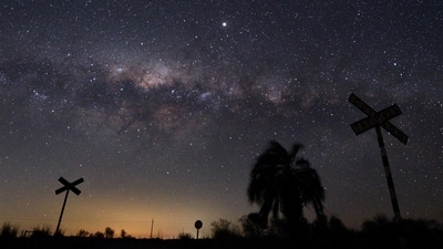 The Milky Way's Galactic Centre and Jupiter (brightest spot at centre top) are seen from the countryside near the small town in Florida. (AFP) The Milky Way's Galactic Centre and Jupiter (brightest spot at centre top) are seen from the countryside near the small town in Florida. (AFP)