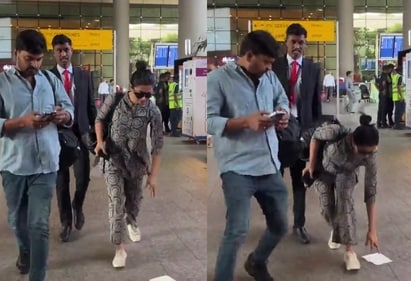 Rashmika Mandanna picking trash at the airport Rashmika Mandanna picking trash at the airport
