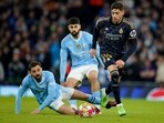 Manchester City v Real Madrid Champions League: City's Bernardo Silva fights for the ball with Real Madrid's Federico Valverde. Manchester City v Real Madrid Champions League: City's Bernardo Silva fights for the ball with Real Madrid's Federico Valverde.