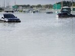 Vehicles sit abandoned in floodwaters covering a road in Dubai, United Arab Emirates. (AP) Vehicles sit abandoned in floodwaters covering a road in Dubai, United Arab Emirates. (AP)