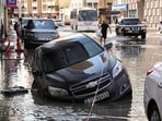 A car is stranded in flood water caused by heavy rains, in Dubai, United Arab Emirates, April 17, 2024. REUTERS/Amr Alfiky