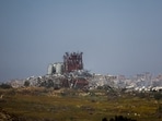 Buildings lie in ruin near Israel's border with Gaza, amid the ongoing conflict between Israel and the Palestinian Islamist group Hamas, as seen from Israel.