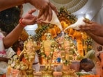 Priests give a holy bath to the idols of Lord Ram, Goddess Sita, Lord Lakshman and Lord Hanuman with a ‘shankh’ at ISKCON temple on the occasion of the Ram Navami festival, in Patna.(PTI)