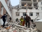 Ukrainian rescuers clear the rubble of a destroyed building following a missile attack in Chernigiv on April 17, 2024, amid the Russian invasion of Ukraine. Ukrainian rescuers clear the rubble of a destroyed building following a missile attack in Chernigiv on April 17, 2024, amid the Russian invasion of Ukraine.
