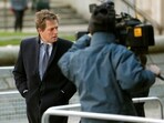 Actor Hugh Grant, a high profile campaigner on press intrusion, arrives to attend the release of Lord Justice Brian Leveson report on media practices in central London November 29, 2012.
