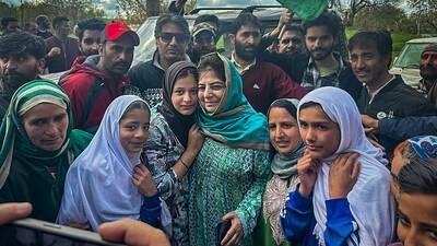 Peoples Democratic Party (PDP) President Mehbooba Mufti with supporters during an election rally in Kulgam, UT of Jammu & Kashmir. (PTI) Peoples Democratic Party (PDP) President Mehbooba Mufti with supporters during an election rally in Kulgam, UT of Jammu & Kashmir. (PTI)