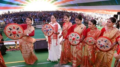 West Bengal CM Mamata Banerjee poses for a picture with artists during a public meeting, in support of party candidate from Karimganj constituency Radheshyam Biswas in Silchar, Assam. (ANI) West Bengal CM Mamata Banerjee poses for a picture with artists during a public meeting, in support of party candidate from Karimganj constituency Radheshyam Biswas in Silchar, Assam. (ANI)