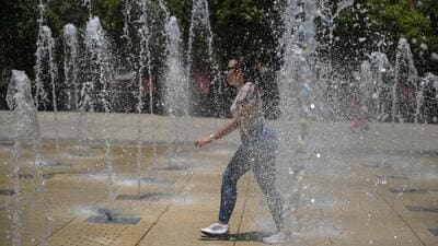 A Cuban tourist cools off at a water fountain in the Monumento a la Revolucion square during a heat wave that hit Mexico City on Tuesday. (AFP) A Cuban tourist cools off at a water fountain in the Monumento a la Revolucion square during a heat wave that hit Mexico City on Tuesday. (AFP)