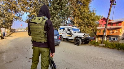 A security personnel stands guard in Anantnag district. (PTI / File) A security personnel stands guard in Anantnag district. (PTI / File)