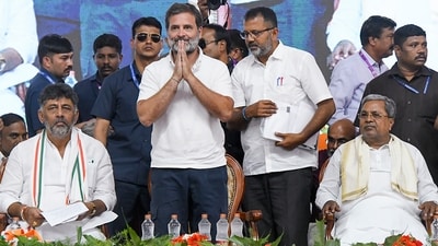 Congress leader Rahul Gandhi with chief minister Siddaramaiah and deputy CM DK Shivakumar during a public meeting ahead of the Lok Sabha elections in Mandya district on Wednesday. (PTI) Congress leader Rahul Gandhi with chief minister Siddaramaiah and deputy CM DK Shivakumar during a public meeting ahead of the Lok Sabha elections in Mandya district on Wednesday. (PTI)