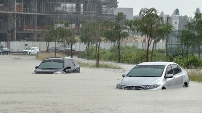Cars drive through a flooded street during a rain storm in Dubai, United Arab Emirates, April 16, 2024. (Reuters)