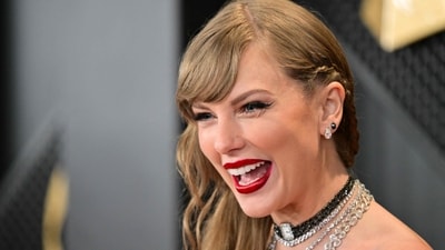 (FILES) US singer-songwriter Taylor Swift arrives for the 66th Annual Grammy Awards at the Crypto.com Arena in Los Angeles on February 4, 2024. Swift was officially named a member of the three-comma-club on April 2, 2024, as Forbes confirmed rumors estimating her wealth exceeds a billion dollars. (Photo by Robyn BECK / AFP) (AFP) (FILES) US singer-songwriter Taylor Swift arrives for the 66th Annual Grammy Awards at the Crypto.com Arena in Los Angeles on February 4, 2024. Swift was officially named a member of the three-comma-club on April 2, 2024, as Forbes confirmed rumors estimating her wealth exceeds a billion dollars. (Photo by Robyn BECK / AFP) (AFP)