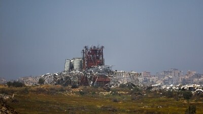 Buildings lie in ruin near Israel's border with Gaza, amid the ongoing conflict between Israel and the Palestinian Islamist group Hamas, as seen from Israel. (REUTERS)